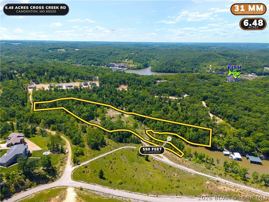 Rare opportunity to own one of the most impressive lakefront parcels to hit the market at Lake of the Ozarks. Over 550 feet of lake frontage on Linn Creek Cove at MM 31 with 6.48 acres of open and wooded ground, gentle to moderate terrain, and stunning cove views in every direction. Zoned PUD, giving a future owner exceptional flexibility for a private estate or residential development. The cove width supports two dock structures and preliminary dock drawings are available showing what could be permitted here. If you have been searching for the right canvas to build something extraordinary at the lake, this is it.