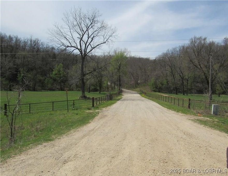 PRICE IMPROVEMENT!! Nearly 10 acres UNRESTRICTED Morgan County diverse property, wooded landscape, offering the perfect canvas to bring your dreams to life. Whether you're looking for a peaceful retreat, a hunting haven, or fertile soil for gardening, this property provides an exceptional opportunity for a variety of uses.  Ample Space for a home, Shouse, Shop, Garage, Park an RV or additional structures for storage or hobby use. Old Foundation & RV Pad – Existing structures that offer a head start on development. Power at Road Corner. An old septic system is present, but the property is sold as-is with no guarantees. This property presents incredible development potential.  Schedule a showing today to explore all that this property has to offer!