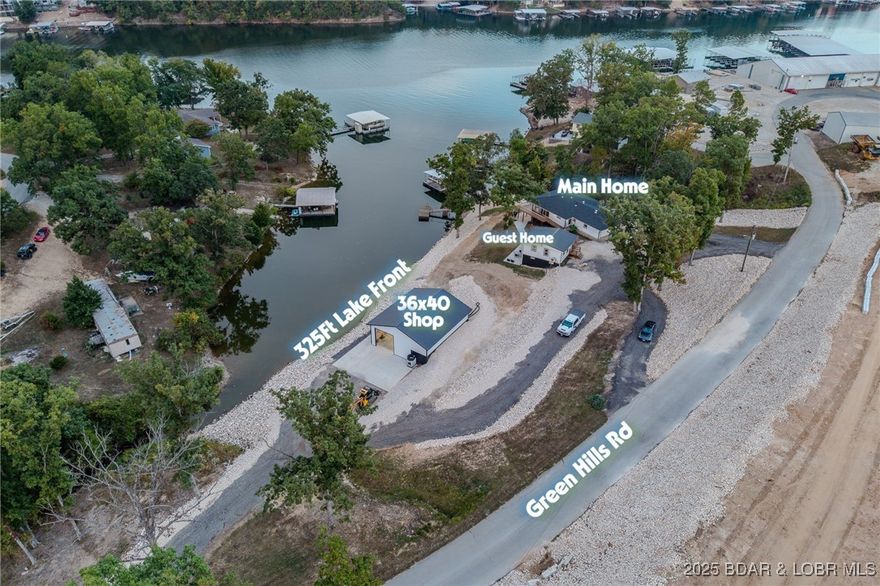 Highly Motivated Seller – Incredible Opportunity! What a unique and versatile setup! Situated on 1.2 acres of fully rocked, low-maintenance ground, this property offers a 3 bed, 2 bath main home with attached 2-car garage and true main-level living. The main floor features 3 beds, 1 full bath, a spacious open living/dining area, and a functional galley-style kitchen. The lower level expands your options with a second living area, 2nd kitchen, and additional full bath—ideal for guests or rental potential. The 960 sq ft guest home comfortably sleeps 4 and has been fully updated with new exterior paint, metal roof, luxury vinyl plank flooring, mini split, fresh interior paint, recessed lighting, and a custom spiral staircase leading to a finished studio-style lower level. Enjoy the lakeside patio, plus a 36x40 shop with two 12x12 doors, drive-through access, concrete floors, and electric. Ample parking throughout. Located in South Buck Creek Cove and next to Buck Creek Marina, with a proposed RV park across the street (more rental potential). Live in one, rent the other—most of the big-ticket items have been completed. Homes being sold fully furnished. seller is ready to make a deal!