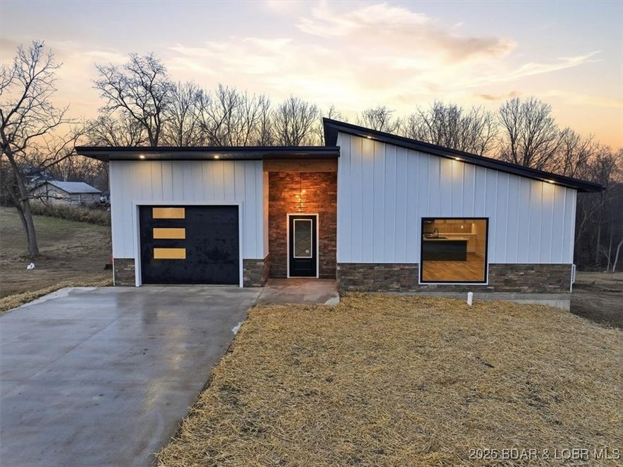 Your dream home awaits in this brand-new, stylish 1,920 sq ft house, perfectly located on a lovely city lot. This ready-to-move-in home has 3 bedrooms and 2.5 bathrooms, showing off its quality and making you feel warm and welcome right away. Every detail of the house has been carefully thought out, from the smartly designed kitchen and peaceful back porch to the walkout lower level living area. It also includes a one-car garage and plenty of storage. Located in the growing town of Versailles, this home puts you in a friendly community, offering both convenience and charm. This home offers the perfect mix of modern luxury, comfort, and community for today’s buyer. Bring your offers today!