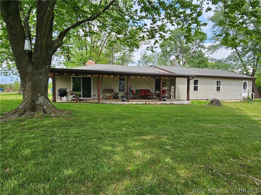1014 Railroad Pond Rd, Eldon, MO.Beautiful new listing offering the best of both worlds — small-town convenience with true country privacy. This renovated one-level home sits on 3+ acres and features energy-efficient solar power. Inside you’ll find a spacious open-concept layout with a large living room, separate family room, and cozy wood-burning fireplace. The expansive kitchen boasts a large island, tile flooring, and a walk-in pantry. Additional highlights include a huge craft room/home office, luxurious primary suite with massive walk-in closet and 2 private baths, plus an oversized laundry room with PureWash Pro. 
Outdoor Features:Massive 35x50 shop with 3-phase electric and concrete floor, Huge covered porch, In-ground pool, Plenty of room to garden, entertain, or relax. Properties like this are rare — updated, one-level living on acreage with a big shop, pool, and solar power. Property is already divided, so there is room to build. City Water, Private septic, 40 Solar panels, Telsa powerwall (2/2026 installed) . Don’t miss it! Ready for a private showing? Contact us today!