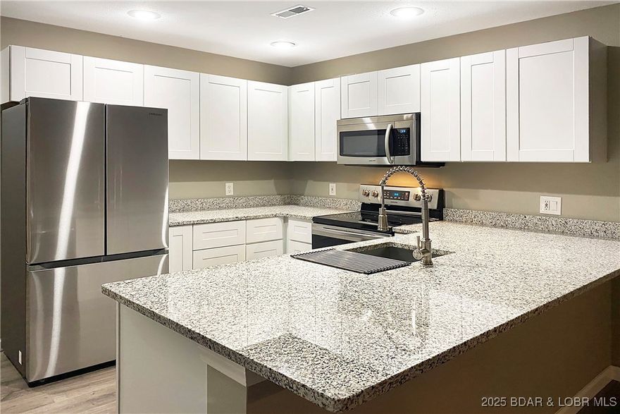 Million Dollar View for a fraction of the price. This 1185-sf 3-bedroom 2-bathroom waterfront condo at Harbour Bay on the 18MM is what everyone has been waiting for, nestled between Porto Cima and The Villages. Top-floor, End-unit, vaulted ceiling, AND right in the middle of all the action at Lake Of The Ozarks. The new location for the 2025 Shootout is less than 2 Miles away, and this complex is minutes away from countless restaurants and amenities (by water and road). NEW HVAC in Fall of 2023 (parts warrantied for 10 years), and newer items in 2021 (kitchen, granite, flooring, appliances, water heater, bathrooms, washer and dryer, etc). Breathtaking sunrises will start your day off the right way. Perfect community for part or full-time living. Being only 74-units in the complex it is well-maintained, and setup for family and friends. Private pool, gated subdivision, affordable assessments, and leased cruiser slips are available at the complex or at The Villages Marina right up the road. Call today and see why this is one of the best units available at The Lake.