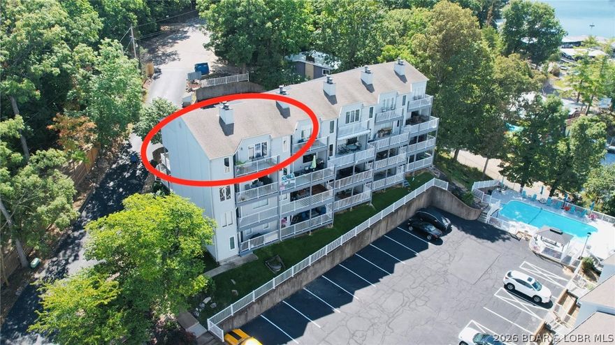 Seller is offering $2,000 towards buyers closing costs! Check out this Top-Floor Condo with Stunning Main Channel Views! This 3 bedroom, 3 bath beauty at the 4 MM is fully updated and truly turn-key. Highlights include: Updated kitchen with new cabinets, granite countertops, and stainless steel Whirlpool appliances, fresh paint throughout, cozy wood-burning fireplace, primary suite featuring newer LVP flooring, all bathrooms have been updated as well. It also includes a 12x32 ft boat slip and comes fully furnished & ready for immediate use.