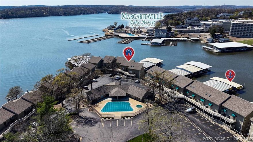 Fully updated, turn-key condo with incredible views and a large boat slip in the heart of Osage Beach—this is the one buyers wait for. Located in the established Pelican Bay complex, this 3 bed, 3 bath with loft offers nearly 1,500 s.f. of well-designed space that comfortably sleeps a crowd. The kitchen and baths have been beautifully updated with quality finishes, complemented by new flooring and fresh paint throughout, creating a clean, modern feel with nothing left to do. The open living area flows to the deck where you’ll take in some of the best lake views around. Included is a highly desirable 14x32 boat slip, giving you room for a larger boat & easy access to the water. HOA dues here have remained steady & affordable—something that’s becoming harder to find at the Lake. HUGE clubhouse includes bathrooms, kitchen, board room & party room - recently updated it provides great spot for meetings, parties, etc. Convenient by land or water, you’re right across from Margaritaville & just minutes to popular waterfront spots like Paradise, Papa Chubby’s, & Miller’s Landing. Ideal for full-time living, a weekend retreat, or investment property - don't miss this opportunity!