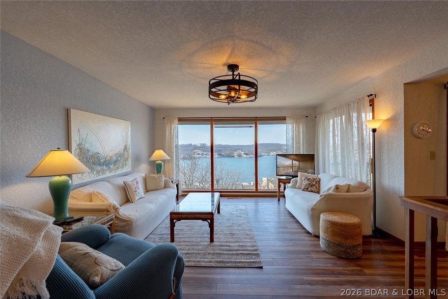 Experience lake life at its finest in this stunning two-level, 1,536 sq. ft. condo at the Lake of the Ozarks. Fully updated and completely turn-key, this beautiful retreat features all-new flooring, modern appliances, a new water heater, updated lighting, stylish countertops, and more. Enjoy breathtaking, jaw-dropping lake views from not one, but two spacious decks. The open layout provides plenty of space for family and guests, while large windows capture the beauty of the water from inside. This property also includes a boat slip, making it effortless to get out and enjoy the lake, with a boat available for additional purchase. Perfectly located in the heart of Osage Beach, this condo offers unbeatable access by both boat and land. You’ll be right in the middle of all the action, just moments from popular waterfront destinations like Redhead Lakeside Grill, Shorty Pants, and Margaritaville—putting the best dining, entertainment, and lake fun right at your fingertips. Whether you're looking for a full-time residence, vacation getaway, or investment opportunity, this condo delivers the ultimate Lake of the Ozarks lifestyle.