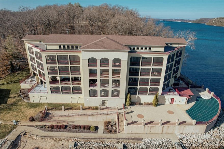 Where dreams become a realty, this 1999 sq ft Tuscan Style corner unit condo, finished in 2014, comes complete with furnishings & decor. Located at the 31mm with incredible views and nearby waterfront restaurants, this condo includes 3 bedrooms(2masters), 3 full baths, expansive screened in deck, private secured parking garage, elevator from garage to your unit as well as the convenience of no steps to the dock.The unit features an open floor plan perfect for entertaining guests. Upgrades include: Custom wainscot panels, 2 custom tiled showers, plantation shutters throughout, granite kitchen counter tops, SS appliances, jacuzzi tub, electric fireplace & Laundry room. Complex features paved roads to the guest parking and your front door & lake front hot tub, pool with restroom, a handicap ramp to the boat dock that accommodates a wagon, walker or wheelchair. Complemented by a 16x 40 boat slip with wave breaks and reserved parking space in garage. Yearly rentals only. Additional parking space and PWC slip with lift are negotiable. Discover unmatched privacy and tranquility at this quaint 20 unit Bella Sera Condominium complex.