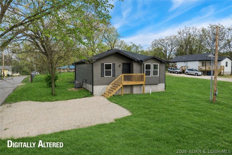 Welcome to your affordable, inviting, new home in the heart of Camdenton! This home is conveniently located near schools, shopping, and restaurants. This brand-new gem offers the perfect blend of comfort and livability with 1,100 sq ft of thoughtfully designed space with attractive LVP throughout. Step into the sun drenched living room that invites relaxation and provides a spacious gathering space. You will appreciate the generous kitchen, complete with an abundance of cabinets for ample storage and plentiful workspace.  You will adore the spacious primary bedroom with a walk-in closet and a large bath with additional closet. The second bedroom would be a perfect office for someone who works remotely. The deck off the kitchen offers a convenient space for cooking out. Having two driveways - one in back an one in front - will provide for plenty of parking.  Whether you’re downsizing or seeking your first home, this stylish residence offers everything you need—don’t miss out on making it yours!