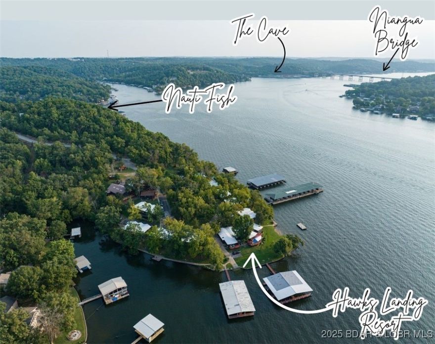 Don't miss out on the opportunity to own a family friendly resort.  Hawks Landing Resort is a 23 unit plus owner’s home located on approximately 7.5 acres on the 4 mile marker of the Big Niangua with 1,275’ of lakefront. Close to The Cave and Nauti Fish. There are 22 lakefront units and 1 lakeview unit. The owner’s home is 4 bedroom, 3 bathroom, lakefront with a huge deck. The amenities are incredible. 4 docks with 40 covered slips. 30’ x 30’ fish house with 2 wells, 2 woodburning stoves and lakefront open area of 10’ x 30’. 12’ x 24’ swim deck. Beach area. Indoor pool/hot tub with large deck. Game room, deck off of the game room with lots of seating and large charcoal grill. Playground. Picnic area with large charcoal grill. Sand volleyball court. Basketball court. Private boat ramp. Boat trailer parking. Several returning guests each year.