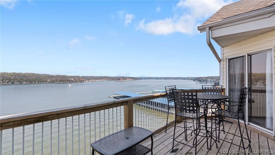 Welcome to this beautiful top-floor, turnkey condo in the heart of Osage Beach! This updated unit offers stunning views of the 21 MM of Lake of the Ozarks. Inside, you’ll find updated appliances and newer furnishings, making this property truly move-in ready. Whether you're looking for a personal weekend getaway or a smart investment, this unit is approved for nightly rentals—offering excellent income potential. The spacious two-story living room features soaring vaulted ceilings, an abundance of natural light, and direct access to the private deck—perfect for enjoying those incredible lake views. The primary suite includes an ensuite bath with double vanities for added comfort and convenience. Upstairs, the loft overlooks the main living area and serves as a second living space, also showcasing beautiful views of the lake. This property includes a 10x30 boat slip and access to fantastic community amenities such as a sandy beach, 2 community pools, and a  playground—all within a short-term rental-friendly complex. Don’t miss this opportunity to own a piece of lake life at its finest! Call for a private showing today!