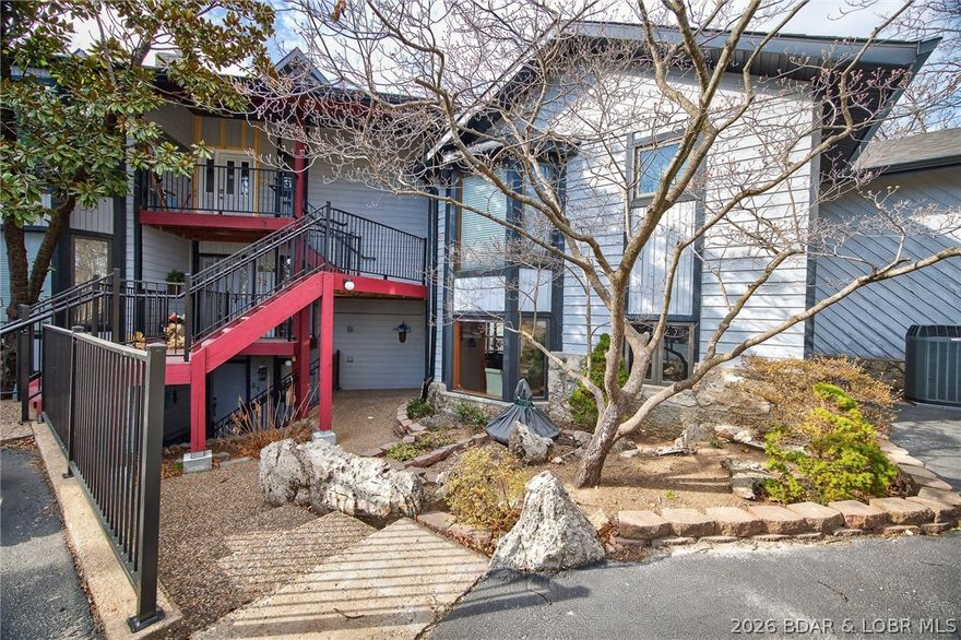 Come see this perfectly laid out condo that comes fully furnished, perfect for vacation rentals or your own special getaway place! This home was very well taken care of and features large deck space and awesome views of the amazing Lake of the Ozarks. There are two bedrooms and two full bathrooms, beautiful functional kitchen, dining area with tons of natural light and gorgeous living room space featuring mirrors and even a fireplace! Each bedroom has their own access to the large deck space, where you can catch the wonderful view of the Lake! Spend some time outside as it is a peaceful haven, just as much as the inside is! This is a main level unit with only a few steps to the door and ground level parking! Just minutes from so many local amenities right near the heart of Osage Beach and Lake of the Ozarks! Projected Theme Park to be built right across the street, so this will be an excellent place to stay while vacationing! Video Tour Available!