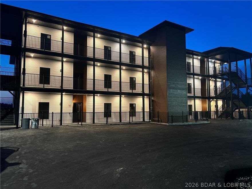 Welcome to the newest building at Robin’s at the Water’s Edge—one of the most premier destinations at Lake of the Ozarks! These brand-new 3 bed, 3 bath (all en-suites) units are designed for comfort and style, with open-concept layouts, upgraded flooring, granite or quartz tops throughout, and 8’ sliders leading to spacious covered concrete decks with stunning lake views. The lakeside master suite features a tiled shower and double vanity. Located at the 1MM on the Grand Glaize Arm, you'll enjoy gentle lakefront access and breathtaking main channel views. This ideal Osage Beach location puts you close to dining, shopping, and the State Park—perfect for boating, skiing, tubing, and fishing. Robin’s offers exceptional amenities including two private pools, a sandy beach, a covered/enclosed fishing dock, private boat ramp, and community docks with slips available. Elevator access to all floors ensures ease and convenience. Whether a weekend retreat or full-time residence, this is luxury lake living at its best. Photos from model unit 2A. A onetime fee of $1000 will be collected at closing from the buyer to establish​​‌​​​​‌​‌​​​​‌​​‌​​​​‌‌ reserves.