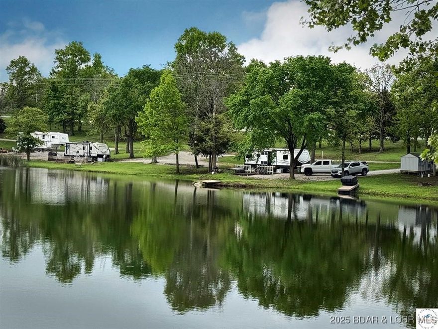Income Property Alert! Looking for your next big investment? This Truman Lake campground & lodging property is packed with income streams and ready to roll! What’s Included: --> 51 RV Sites (full hookups) --> 4-Room Motel + 3 Cabins --> 16 Storage Units --> 1,800+ sq ft 3-Bay Shop (one bay rented) --> Stocked fishing ponds (2.5 ac & ¾ ac) --> Pavilion + Coin Laundry -->Commercial Well ***Bonus upside: Manager’s apartment & shower house ready for renovation = more revenue potential! +Minutes from Osage Bluff, Sterrett Creek, Drake Harbor, Truman State Park, Truman Dam & Long Shoal marinas. + Multiple streams of income – RV park, motel, cabins, storage, shop rental & more! ------- **** Don’t miss this rare opportunity to add a powerhouse property to your portfolio.