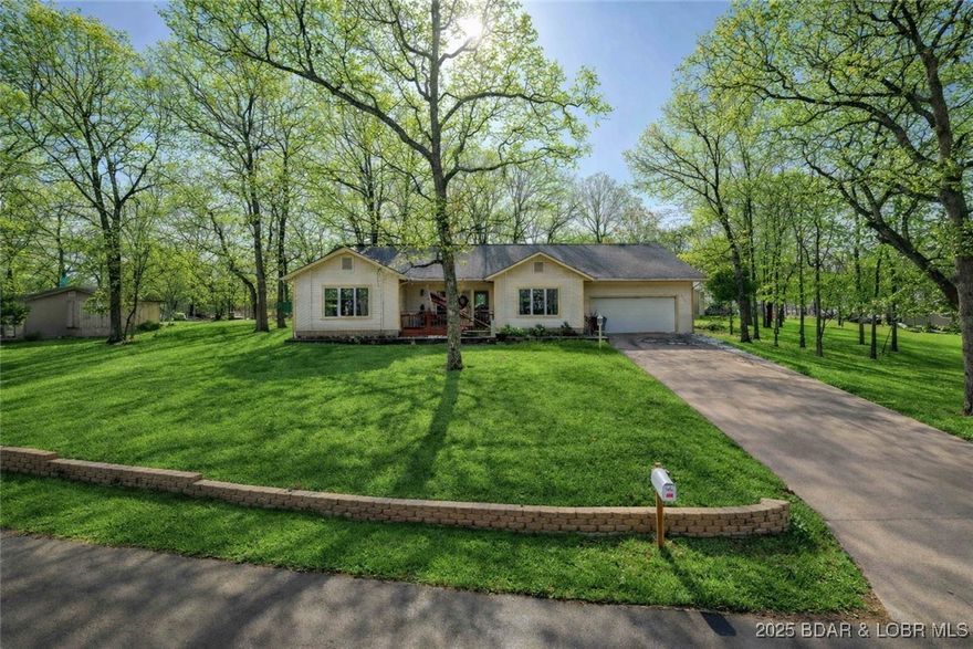 Osage Beach buyers — don’t miss this fully remodeled, one-level home in an unbeatable location. This home offers a completely updated kitchen featuring high-end appliances, new cabinetry, upgraded countertops, and both casual and formal dining spaces. The home includes two full primary suites, providing exceptional comfort for guests or multi-generational living Enjoy the lake view from your front porch, or step outside to a spacious patio and enjoy being just steps from the community pool, playground, tennis courts, and boat ramp—perfect for embracing lake living without the maintenance. Situated down Three Seasons Road, you’re only minutes from popular waterfront spots like Redhead Lakeside Grill, Shorty Pants, and Margaritaville. You can’t beat this location for full-time living: only one exit from the hospital and perfectly positioned between Camdenton, Lake Ozark, and Osage Beach.  If you’re searching for a fully renovated, move-in ready home in a highly convenient location, this one checks all the boxes. Schedule your tour today!