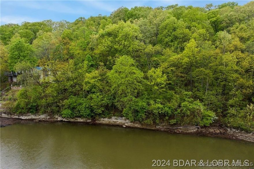 Nice Lake Front Building Lot at the 68 MM in Little Buffalo Creek Cove. Good water depth for a Boat Dock. 74.5 Feet of Lake Front and nice Lake View. Quiet area on the Lake and recently surveyed. Also, includes 40x75 Second Tier Lot.