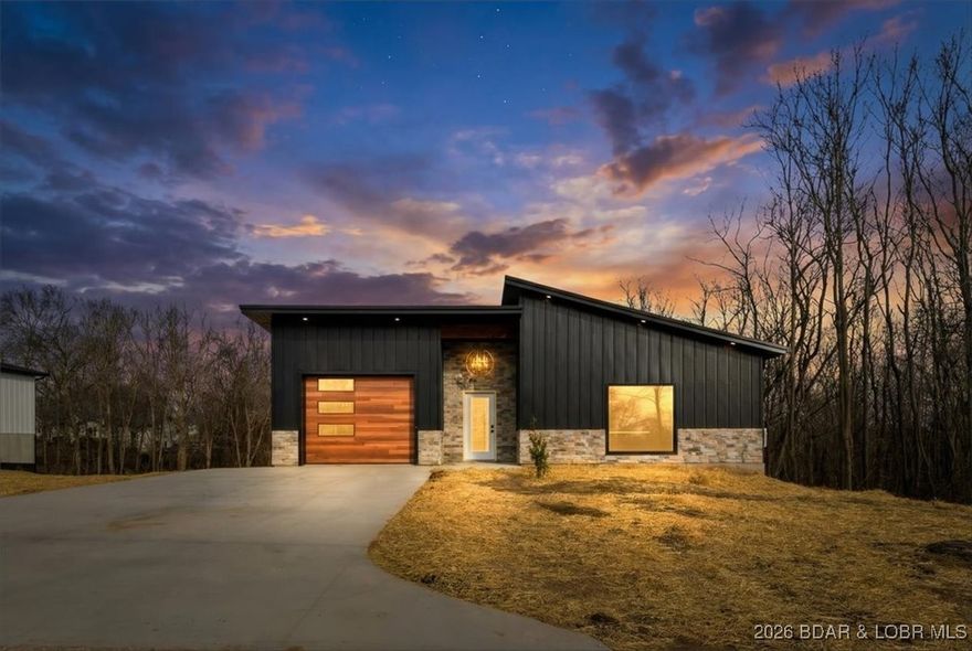 Discover this stunning, brand new construction home, perfectly situated in the growing town of Versailles. This contemporary 1,920 square foot home features 3 bedrooms and 2.5 bathrooms, designed with an open kitchen and living room floor plan ideal for modern living and entertaining. Enjoy a large primary bedroom complete with a private bathroom, plus a convenient one-car garage and a private deck for outdoor enjoyment. The finished walkout basement offers two additional bedrooms, making this home truly spacious and versatile. This ready-to-move-in property blends style, comfort, and a great location, waiting for you to call it home. Schedule your showing today!