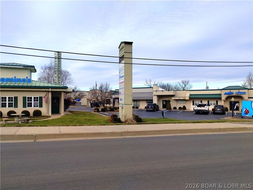 Very well kept shopping plaza next to the Osage Beach Post Office and across the street from the entrance to Lake of the Ozarks State Park. Tenants currently include E. Wayne Thomas Construction, Lake Behavioral Health, Swift Safety Institute, Karats and Carats Jewelers, Box Drop Mattress, Matt Smith Real Estate Co., ASP America's Swimming Pools and Dominos' Pizza. Subject unit is currently occupied by Swift Safety Institute. Base rent of $8.00 per square ft. plus your share of real estate taxes, insurance, water and sewer (equals $3,301 per month) plus CAM fee of $436 = $3,737 per month payout