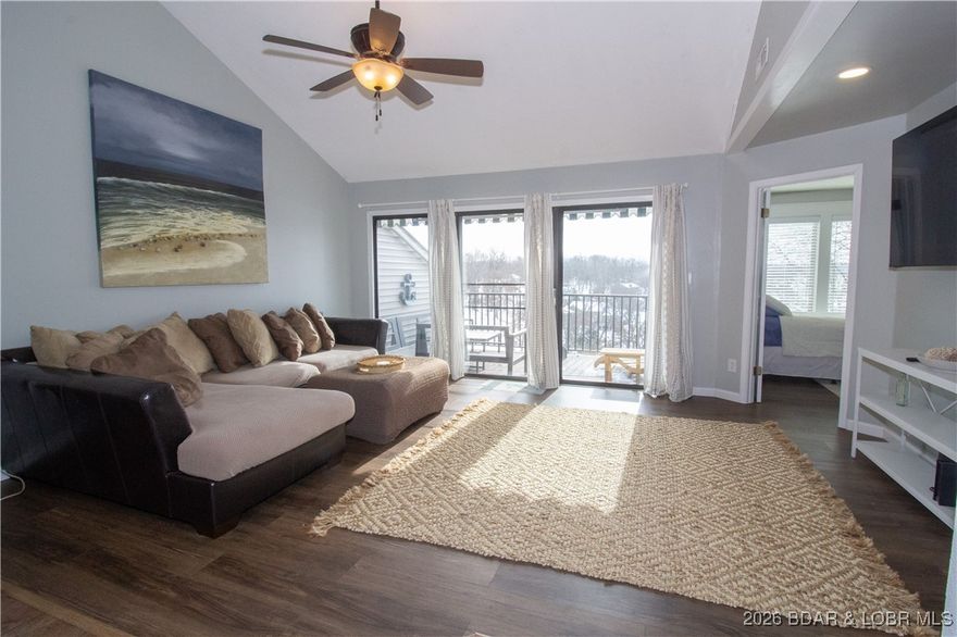 Enjoy lake living with comfort, convenience, and investment potential at the Lake of the Ozarks. Located at MM 9, this well positioned 2 bedroom, 2 bathroom condo offers beautiful lake views and easy access to area dining, boating, and attractions. The open living area flows to a private balcony, the perfect spot for morning coffee or relaxing after a day on the water. A functional kitchen with under the counter ice maker, spacious bedrooms, and two full bathrooms make the layout ideal for full time living, a weekend retreat, or guest accommodations. Residents and guests enjoy resort style amenities, including two outdoor pools and hot tubs, adding to the low maintenance lake lifestyle this property offers. Home will come furnished and features a new roof from Summer 2025!