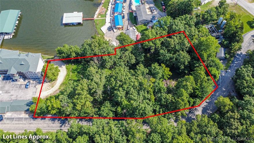 Incredible development opportunity at the 3-mile marker of the Big Niangua, just past the popular Four Corners area. This rare lakefront offering includes over two acres of prime property with unbeatable potential. Located adjacent to the brand-new Niangua Commons condos, this site is surrounded by new growth and activity. Hard surface roads provide easy year-round access, and the property boasts both an exceptional water views, as well as a convenient road location for future access and visibility. Whether you're looking to create a multi-family project, or a lakefront investment, this property is ready for your vision. With utilities nearby and gentle topography, the groundwork is in place for development. The possibilities here are endless—act now and bring your dream project to life. GIS property lines attached to listings may not be accurate.