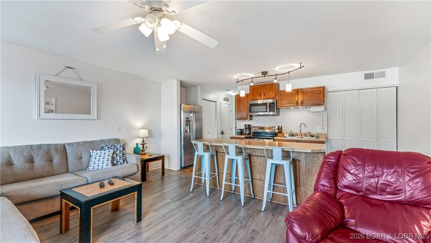 Discover an affordable investment or perfect weekend getaway with this updated 1-bed, 1-bath condo at Southwood Shores! Located at the 12MM at Lake of the Ozarks, this turn-key unit features new vinyl flooring, updated kitchen appliances, and comes fully furnished—including décor and electronics. Enjoy relaxing on the spacious outdoor deck with views of the main channel. Southwood Shores offers top-notch amenities like indoor/outdoor pools, swim dock, clubhouse, playground, boat ramp, trailer parking and more. Whether you're looking to invest or escape, this condo is ready—schedule your showing today