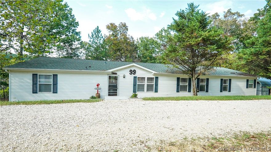 Welcome to your lakefront retreat! This super cute, updated 4 bedroom, 2 bath lakefront home offers the perfect blend of comfort, space, and privacy. With 2,310 square feet of living space on 1.3 wooded acres, you'll enjoy peaceful lake living, surrounded by nature while being in a great location between Osage Beach and Sunrise Beach! Step inside to find 2 spacious living areas, a huge master suite, and tasteful updates throughout. You'll love the new walk in shower with a new shower tower system and master bathroom model. The recently updated deck is perfect for entertaining or relaxing! Outside, there is plenty of room for all your lake toys with a 3 car garage/shop, 2 carports, and a storage shed. The property also includes a one well dock with an 8' x 20' slip! There is also a new septic system for peace of mind! Tucked away in a private setting on the 12 mile marker of the Osage arm, this home is ideal for full-time living or the perfect weekend getaway! Rentals are allowed.