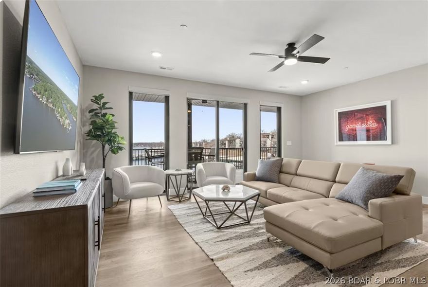 Experience ultimate high-end luxury living at this recently completed waterfront condo with stunning lake views, 12' x 36' covered boat slip, 3 bedroon 3 bath, elevator access, open great Room with large kitchen featuring an expansive island & stainless steel appiances, a large private covered deck with main channel views & resort-style amenities. This unit is being sold turnkey with quality furnishings--it even includes a 2 player video game for extra fun! The Havens at Four Seasons is centrally located & the most sought-after new address at Lake of the Ozarks. Breathtaking unobstructed lake views that encompass all the action in the main channel including passing boats, & holiday weekend fireworks shows from the island in front of the resort are right in your back yard--you will have the best seat at the lake! The HOA amenities are top notch including large resort style pool, fitness center, clubhouse/meetingroom, hot tub, firepit & boat ramp. This property has rentals on the books for 2026 and a great rental history. This is one you don't want to miss!!!