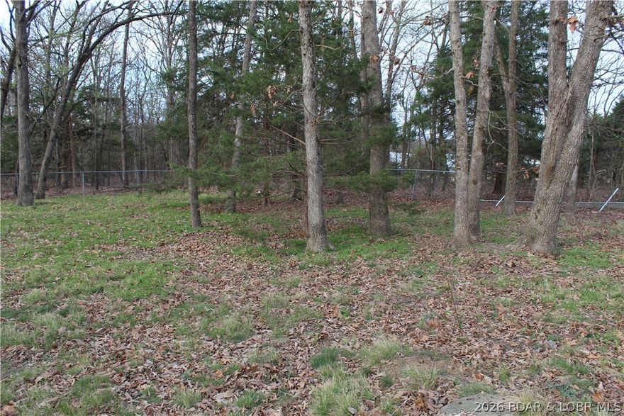 Discover the potential of this 5+ acre property located just over 6 miles south of Iberia, Missouri. With electricity, a well and lagoon system already in place, a concrete slab for a 2-car garage, and a large concrete storm shelter, much of the groundwork is already done—making this an excellent opportunity to build your dream home in the Ozarks. Enjoy the quiet, small-town charm of Iberia with convenient access to local shopping and dining, while still being just a 35-minute drive to Osage Beach, Missouri and all the recreation, entertainment, and amenities of the Lake of the Ozarks.
A 2004 4-bedroom, 2-bath manufactured home currently sits on the property and is being sold with no assigned value due to condition. However, for the right buyer with vision and ability, there may be potential for renovation or repurposing.
Whether you’re looking to build, invest, or create your own private retreat, this property offers a strong head start and plenty of possibilities.