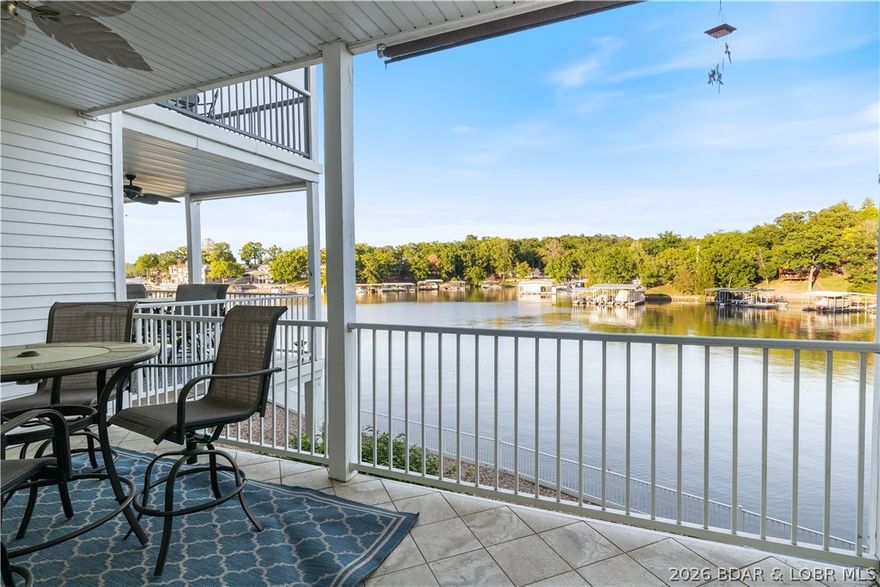 Discover effortless lakefront living in this well-appointed 3-bedroom, 2-bath condo at Lake of the Ozarks, nestled in Osage Beach. With 1,391 square feet of single-level, step-free access, this home combines ease and comfort—perfect as a primary residence, weekend escape, or income-producing rental.  Take in sweeping views of the Osage Arm, where peaceful waters and vibrant sunsets create the perfect backdrop. Tucked in a protected cove, the location offers ideal conditions for swimming, boating, and laid-back lake days.  Nightly rentals are permitted, providing strong potential for short-term income. The community features a pool, convenient parking at the building level, and a low-maintenance environment for owners and guests alike.  Included is a spacious 14’ x 40’ boat slip plus an additional PWC slip—perfect for enjoying everything the lake has to offer.
HOA assessments cover key services such as cable, internet, dock reserve, road upkeep, sewer, trash, water, and exterior maintenance, making ownership simple and hassle-free.  Whether you're seeking a turnkey investment or a relaxing lakeside retreat, this condo delivers comfort, convenience, and exceptional views.