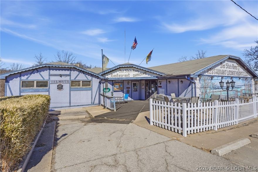 Exceptional investment opportunity featuring a fully operational restaurant and entertainment venue situated on 0.48 acres at a long-established commercial site with 45 years of continuous restaurant use. The main-level restaurant offers seating for 112 with an additional 49-person occupancy in the bar/lounge area. The lower level includes a private party space with bar accommodating approximately 30 guests, plus an exterior entertainment area for 40–50 guests complete with outdoor bar, stage, and dance floor. Multiple revenue centers allow for diversified income streams including restaurant operations, bar service, private events, live entertainment, and wedding venues. The property includes a fully built-out commercial kitchen, established dining areas, and event-ready infrastructure.  Additional value-add component includes lower-level living quarters with 3 bedrooms, 1½ baths, laundry, storage, and wine cellar—ideal for owner occupancy, on-site management. Zoned C2, allowing for a variety of commercial uses (buyer to verify). Strong history of continuous operation enhances location recognition and long-term viability. New roof coming soon.