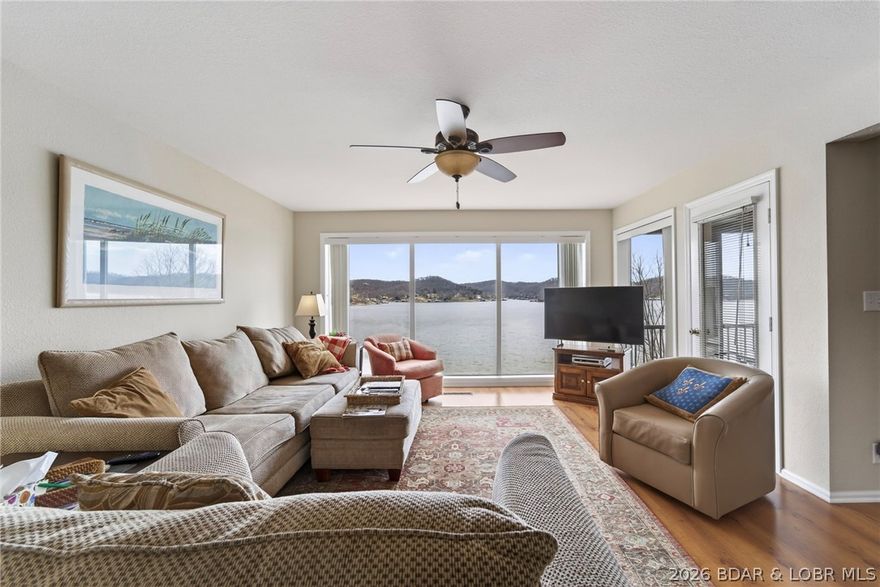 Enjoy lake living at its finest in this beautifully maintained 3 bedroom, 3 bath condo, perfectly positioned to capture stunning main channel views. This move-in-ready unit has been exceptionally well cared for and comes partially furnished.  The open living space is designed to maximize the view, while offering comfort and functionality for family and guests alike. This thoughtfully designed floor plan features two private bedroom suites, including a spacious primary suite with a large walk-in closet—providing comfort and privacy for both owners and guests. Step outside and take in the scenery from not one, but two lakeside decks—perfect for morning coffee. Conveniently located with easy access to the pool, this condo offers the ideal blend of relaxation and recreation. A boat slip with lift is included, so you can spend more time on the water and less time planning. Situated in a well-kept and highly regarded development, you’ll appreciate the pride of ownership and welcoming atmosphere throughout the community. Whether you're looking for full-time or vacation getaway, this one truly checks all the boxes.