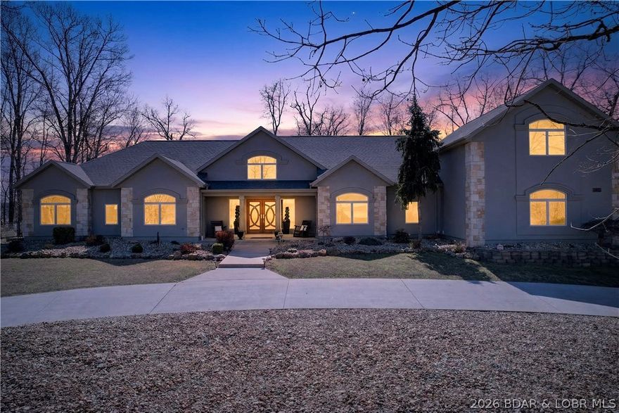 Stunning updated home in highly desired Horseshoe Bend Area with year-round lake views. Welcome to this beautifully updated 4-bedroom, 3.5-bath home (2024–2026 updates) offering timeless elegance, comfort, and year-round lake views. Step through the gorgeous, inviting front doors into an open living space with vaulted wood ceilings with exposed beams, two fireplaces, and heated Travertine floors throughout. The expansive kitchen is designed for both entertaining and everyday living, featuring a gas cooktop, double ovens, premium finishes, and generous counter space. The master suite offers a private retreat with walk-in closets, a spa-like bath with air-jetted tub, and a luxurious shower.Additional highlights include a 3-car garage with a finished guest suite above (bedroom and bath), a circle drive, and a fenced backyard ideal for pets or play. Enjoy outdoor living year-round with a screened patio and gazebo, perfect for taking in those beautiful lake views. This home combines thoughtful design, quality updates, and a truly desirable location — a rare opportunity in the Horseshoe Bend area. Schedule your showing today, this home won't last long!