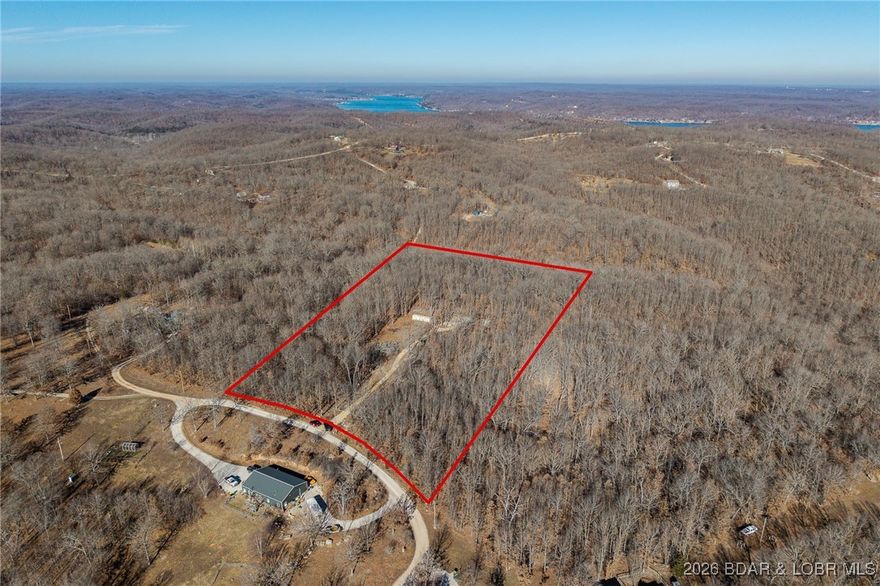 Build your dream home on this versatile 9.44-acre property located outside city limits with no HOA and no building restrictions—giving you the freedom to create exactly what you want. The land is already well-equipped with a 310-foot encased, freeze-proof well house and media hookups for a generator, making it ideal for both building and off-grid flexibility.

A 20’ x 37’ concrete pad is in place—perfect for parking an RV while you build or setting up a tiny home. The property also features a small lagoon, a 40-foot storage container, and a gated entrance with gravel drive for easy access and security.

Trees have been cleared along one side of the driveway to allow for future power pole placement, and the seller is offering a $1,800 concession toward power pole installation. Whether you’re planning to build now or invest for the future, this property offers the space, infrastructure, and freedom to make it your own.