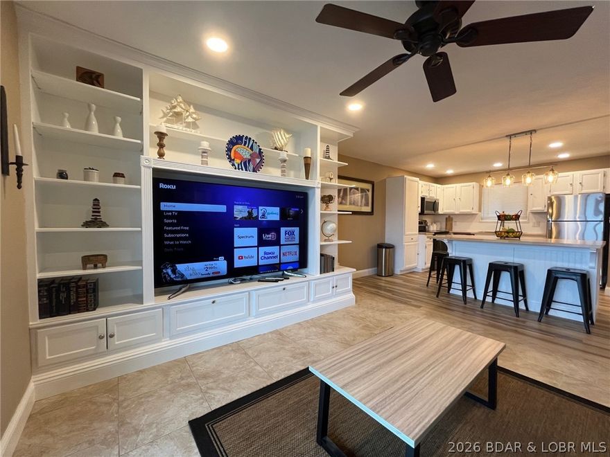 COMPLETELY UPDATED over the last few years with Stainless appliances, Butcher block island & countertop, Custom built in entertainment center for the included 75" TV, HVAC system, Tankless hot water & instant hot water at the kitchen sink, Water softener, Ceramic tile & laminate flooring, Six panel doors & trim, Anderson doors & windows, Recessed LED ceiling lighting installed in all areas. Beautiful sunrises with no afternoon sun on your large 8' x 30' screened maintenance free composite floor deck. NO WAKE cove location offers a huge main channel view at the 21mm. You will enjoy the boats slowly coming and going to Redhead Yacht Club & Shorty Pants next door. Three Seasons condominiums are quiet, well managed & maintained with low HOA fees. Includes a 10x24 slip 7 with 3' roof extension & 5000# lift plus a covered PWC slip 17-B & lift. Both slips located directly out front in dock 4. Just one flight up from parking.