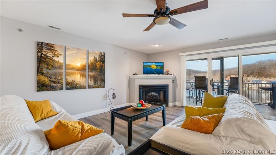 This turnkey property has been fully updated, ensuring an immediate enjoyment of lake life! Recent improvements include a brand-new boat lift and HVAC system, installed in late 2025. Prior upgrades encompass solid surface, white-veined countertops, custom white cabinetry, a unique backsplash, a new bathroom vanity, light LVP flooring, and fresh paint throughout. The two-bedroom, two-full-bath layout offers both privacy and spacious common areas, featuring a large living room that seamlessly connects the kitchen to the screened-in, concrete, covered deck. A slider from the master bedroom provides an ideal space for tranquil mornings and evenings. The community pool is conveniently located just steps away. Situated in a deep-water cove, this property allows for easy floating and lake days directly from the dock. Located just off the main channel, it provides convenient access to a variety of lakeside establishments and entertainment options. With rentals not permitted in this complex, residents can enjoy a peaceful, welcoming atmosphere.