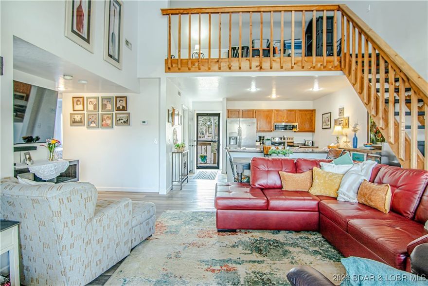 Are you looking for an Awesome weekend getaway or full-time living lakefront property?  Well here it is!!!  This fantastic condo is in a cove location with a main channel view from the deck.   It has the Master and guest bedrooms on the main level with two updated bathrooms. Kitchen is open to the living room for a spacious living area. When you have guests or your children want their own space this unit is perfect.  It has a large loft area with a separate bedroom and full bathroom and walkin closet.  The complex offers two pools, one main channel and one in the cove, tennis, playground and clubhouse.  You can see and shout to the included boat slip and lift from the deck.  The location is great by land or water.