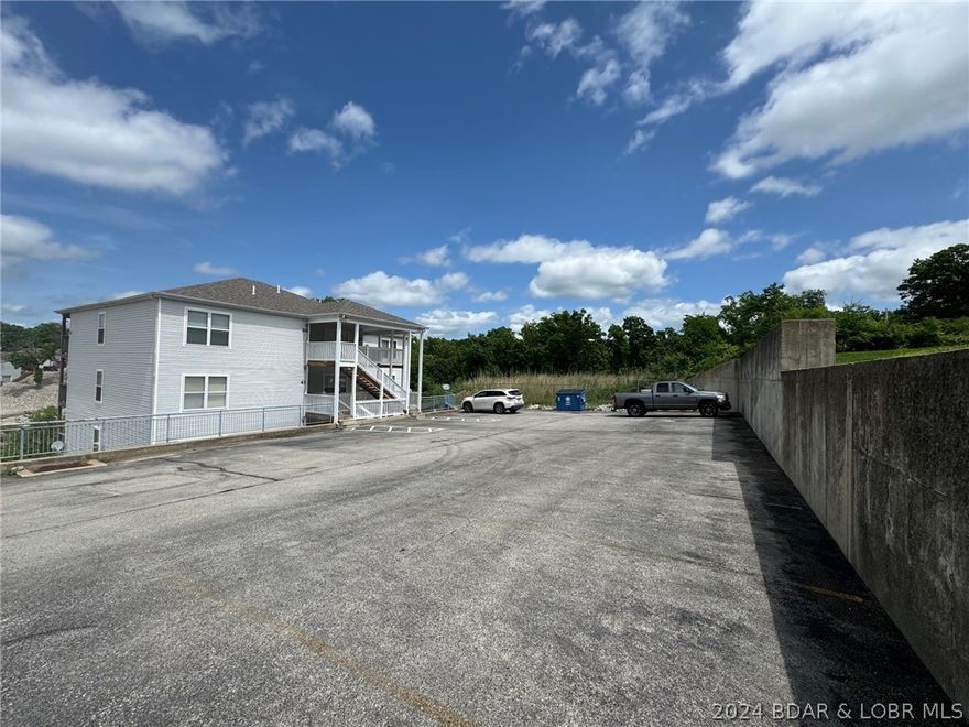 DEVELOPERS TAKE NOTICE!!! Centrally Located in Osage Beach at the 21 Mile Marker. This property is shovel ready for 9 Unit Condos/Apartments or Luxury Triplex. This is a remaining parcel from Autumn Hills Condominium Development. Utilities in place, two dock slips included, Great Opportunity for VRBO or you name it. Few opportunities such as this come around.