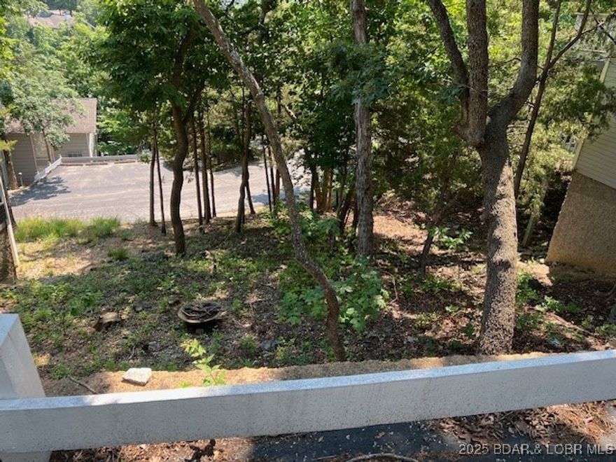 Dreams really do come true! Be a part of Margaritaville Lake Resort Lake of the Ozarks, formerly known as Tan Tar A, The Oaks. Build your dream home on this fantastic course that displays the Ozarks in all its beauty. Exemplifying what Lake of the Ozarks resort golf should be, gnarled cedars, stately oaks, dogwoods and redbuds cover the rolling hills of the Oaks. The golf course's 6,432 yards, 11 holes with water and 57 multi-sized traps take each golfer on a journey through the surrounding forests, hills, and sparkling blue backdrop of the lake. The Oaks was the host site for the 1994 PGA Club Pro championship. Close to everything, great restaurants, shopping, attractions, and entertainment. Picture yourself waking up with a cup of java to nature’s beauty outside every window. During the day, cruise the course for a game or just to socialize. End your evenings with your favorite drink on your private deck. It’s a lifestyle. Pick your lot today. Restrictions & covenants are on file, please call for a copy.