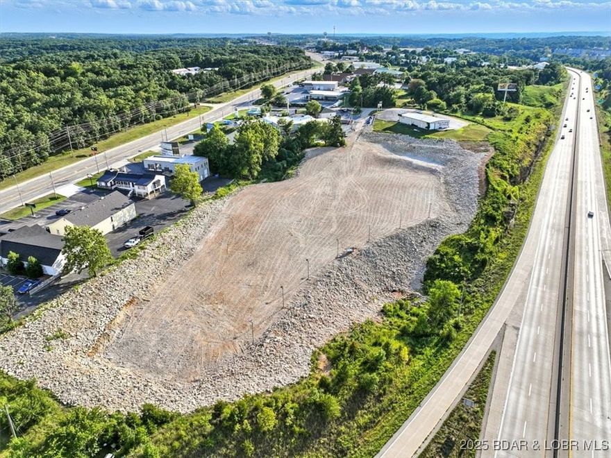 Investors and developers, take notice! This approximate 4.40-acre commercial-zoned property offers an exceptional opportunity in one of the fastest-growing corridors in the region. With an impressive approximate 738 feet of Highway 54 frontage, your project will benefit from maximum exposure and accessibility. Located just one exit from the upcoming Oasis Amusement Park and the 400-room Marriott Hotel, and near the future Bass Pro Shops, this site is primed for high-traffic success. The area is rapidly transforming into a major destination, making this the perfect time to secure your stake. Limitless development potential—ideal for a hotel, business park, shopping center, medical facility, or sports complex. Infrastructure and momentum are already in motion—don’t miss your chance to be part of the next big thing in Osage Beach.