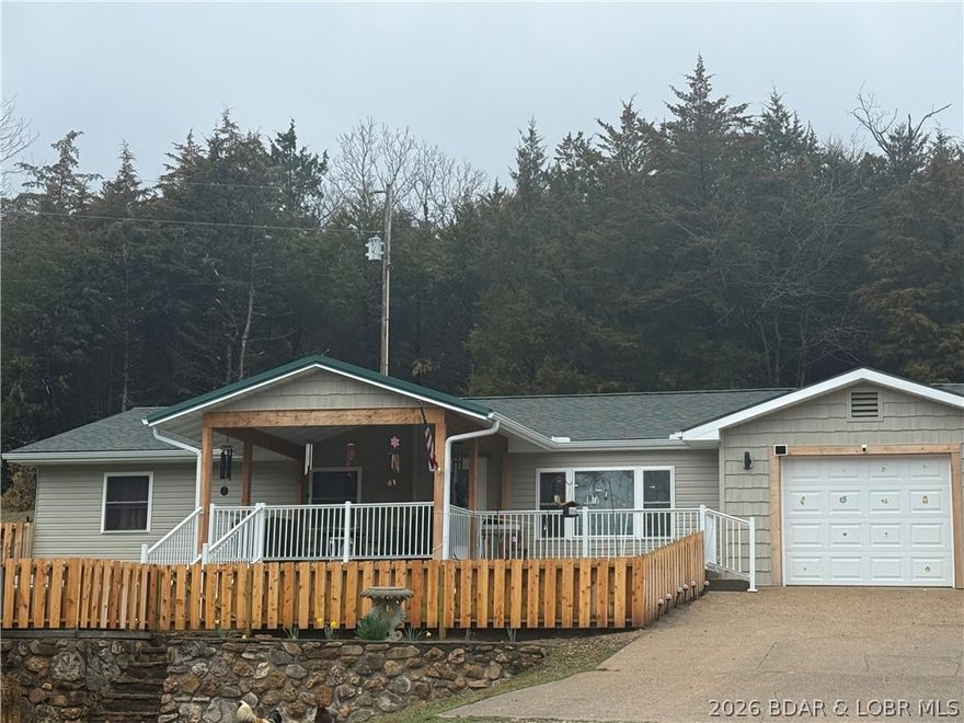 BRAND NEW RENOVATION IN 2025: New Kitchen with all new appliances, huge island with granite countertops, All new plumbing and ductwork, windows, new flooring, new cabinets, garage door with opener.  This lovely 1200 sq ft EARTH CONTACT home went through a major renovation in 2025 that created an open living area for family and friends to gather.  3 bedrooms and 2 full baths that have walk in showers, makes easy one level living and accessible for all.  Outside you will find 4.5 acres with Hwy 5 frontage, a covered Front porch, pool and hot tub are included and ready for summer fun.  1 car garage, 2 car carport and one storage shed.  Yard and porch are fenced in for your pups.  Come see this move in ready home, you won't want to leave.                                ALL FURNITURE/DECOR/TVS/ ARE FOR SALE WITH SALE OF THE HOUSE!