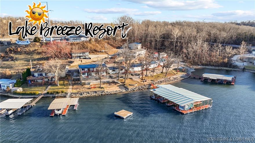 Lake Breeze Resort is back on the market at no fault of the sellers! This commercial opportunity presents a rare opportunity to own a thriving resort in Camdenton on 3MM of the Big Niangua. This charming property is the perfect combination of rustic charm with modern comforts & sits on 1.5 Acres with 495ft of Lakefront. There are 18 total units on the property, including 11 waterfront units, 6 lakeview units & a 3 Bed owners residence that sits above the Clubhouse/Office/Gift Shop & walks directly out to the resort's community pool. This resort features tons of family friendly amenities,s including fire pits, a beach, playground, boat ramp, plenty of boat trailer parking & 2 commercial docks with 17 rental slips, fishing area, swim dock & is being sold completely turnkey! Plus this property offers the opportunity for multiple revenue streams with 2 pontoons, 2 fishing boats & a variety of water toys that can be rented out to guests. Not only is this property income-producing, it is perfectly located by land & water by the Niangua Bridge & across from one of the lakes' most popular waterfront spots, The Cave! Don't miss out on this investment opportunity before summer 2026!