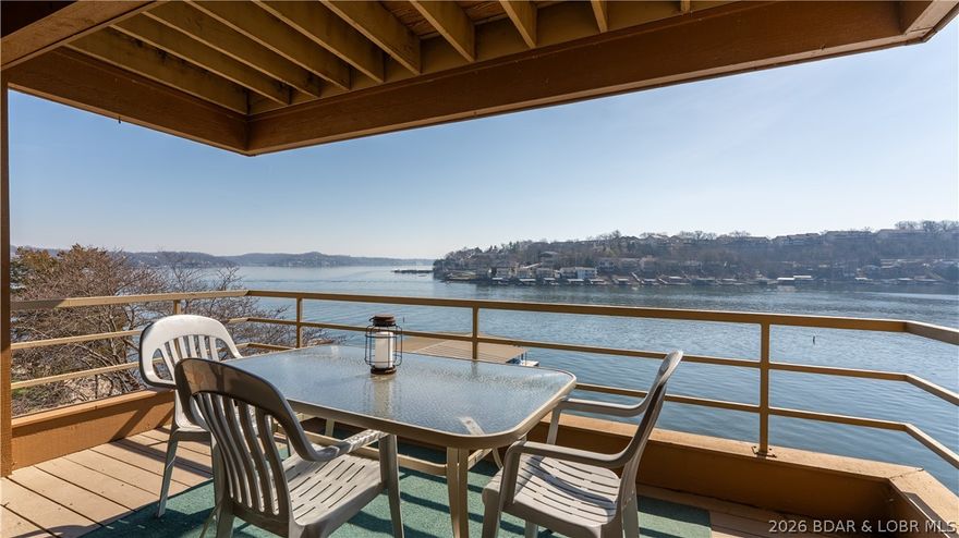 Cove location with sweeping main channel views makes this 3BR/3BA truly desirable. Ideally situated near lake favorites by both land and water, you can enjoy the energy of the lake-or retreat to nearly 2,000 sq ft of living spaced designed for comfort, peace and relaxation. A boat slip plus two PWC slips provide effortless access to days on the water, whether you are cruising, swimming, or heading to your favorite waterfront sports. Floor-to-ceiling windows showcase stunning views from the main living areas and every bedroom, bringing the beauty of the lake into your everyday living.  Perfect for full-time living or a weekend escape, this condo offers the best of both worlds - calm cove waters, expansive views and a relaxed lake lifestyle.  This is where peaceful lake days and wide-open views come together. 32-1B is a place you'll never want to leave...make it your piece of paradise.