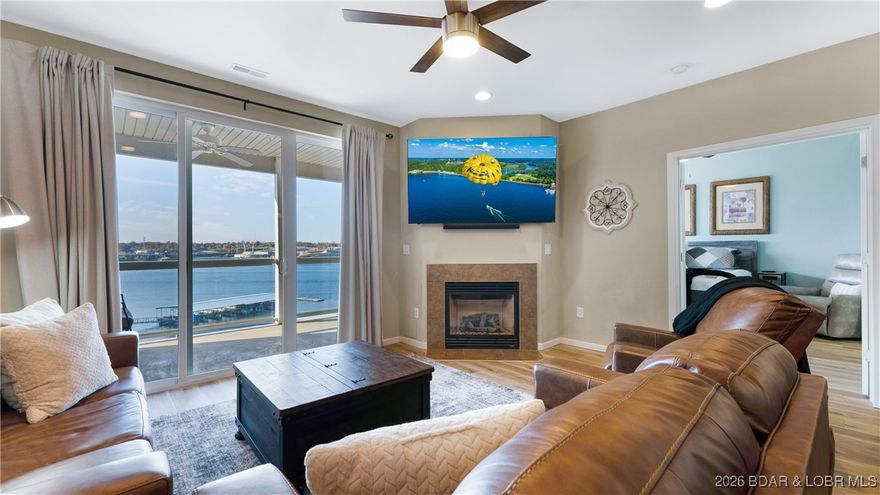 EXCLUSIVE COMPLEX & INCREDIBLE LOCATION — Beautifully updated, turn-key unit in the luxury community of Lands End is ready to enjoy or rent immediately.  Enjoy the serenity of a top-floor residence with stunning main channel views without the inconvenience of stairs, as the entry is just steps from the elevator. The open-concept layout features high ceilings and expansive lakeside windows that flood the space with natural light and showcase sweeping lake views. The oversized primary suite offers direct access to the deck and a private en-suite bath, and two additional guest bedrooms provide comfortable accommodations for family and friends. Ideally located just minutes from shopping, dining, and entertainment, and directly across the channel from the highly anticipated Oasis development. This high-demand complex features resort-style amenities including a large lakeside pool, splash pool, lazy river, playground, basketball court, and a clubhouse with fitness center and gathering space.  Buy now to enjoy true luxury, maintenance-free living. A 2021 Lowe Tritoon is available for purchase separately, offering an exceptional opportunity for a complete lake lifestyle.