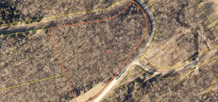 Nice Building Lot on 3.8 Acres at Forbes Lake of the Ozarks Park. A private gated residential & recreational community between Truman Dam to the west & Bagnell Dam to the east. The Park has over 12,800 acres & spans 5 miles of shoreline property along the Lake; 4 private Lakes dedicated to the landowners. The scenic beauty of the Park is enhanced by its natural wooded setting throughout that includes oak, walnut, hickory, elm, sycamore that brings with it the beauty of Missouri Wildlife. The Park has 148 miles of graveled & grass roads that will meet the needs of walkers, hikers, & horseback riders. As a Wildlife sanctuary, you undoubtedly come across a variety of animals, both large & small during your walk. The Park is located on the Principle Mississippi Migration Flyway. This Flyway brings a wide variety of birds to the area. Forbes Park has 3 boat ramps with access to the Lake of the Ozarks. These ramp areas, & amenities are for use by the land owners. Also, available is a nice RV Park, Tennis Courts, Picnic Areas, Playground, 4 Fishing Lakes, Pavilion for group meetings. Enjoy the beauty of the Ozarks. Visit FORBESLOA.COM for more information. Electric on property. C-2 area.