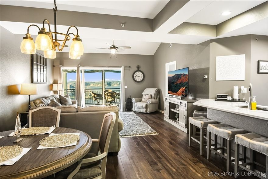 Welcome to your dream retreat! This immaculate 3-bedroom, 2-bath condo at Westshore Falls offers unparalleled privacy as a top-floor end unit, with no neighbors above to disrupt your serene escape. Experience stunning views and breathtaking sunsets from your spacious haven featuring vaulted ceilings that enhance the open and airy feel.  Meticulously updated, this condo showcases newer flooring, elegant quartz countertops, and stainless steel appliances, ensuring a modern and stylish living environment. The tasteful color scheme and quality furnishings make it move-in ready!  Included with this incredible condo are two boat slips in dock 5, with sizes perfect for both larger vessels (16x38 with shore power) and personal watercraft. Additionally, a garage is available for purchase, offering convenient storage for your lake gear and toys. This unique combination of features makes this property the ultimate package for lake living. Whether you're seeking a full-time residence or a luxurious getaway, this well-appointed condo is ready to welcome you home. Don’t miss your chance to own this slice of paradise at Westshore Falls!