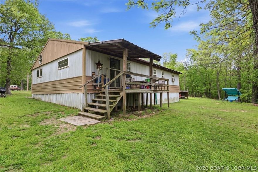 4 Beds | 2 Bath fixer upper in Stover, Mo! A fantastic chance to customize and build equity. Situated on Raccoon Ridge Road, enjoy tranquil country living just a 5-minute walk to the lake, with multiple boat ramps and public lake access nearby. The Wigwam Conservation Area is a 10-minute drive, and several marinas offer boat slip rentals. Perfect for families and outdoor lovers! With 4 bedrooms, 2 bathrooms, and tons of potential, this home is a real find for investors or DIY enthusiast!