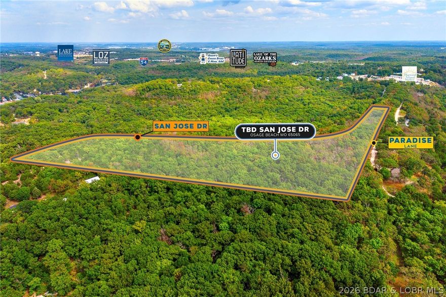 Discover nearly 20 acres (19.5±) in the heart of Osage Beach, perfectly positioned just off Hwy 54 near Runabout Drive. This versatile tract offers the ideal blend of accessibility and seclusion, making it well-suited for development, a private retreat, or recreational enjoyment. Enjoy close proximity to medical facilities, shopping, dining, and entertainment, along with convenient access to public lake entry and everything Lake of the Ozarks has to offer. The property provides a peaceful, private setting without sacrificing the benefits of a central location. Opportunities like this—offering size, location, and flexibility—are rare in Osage Beach.