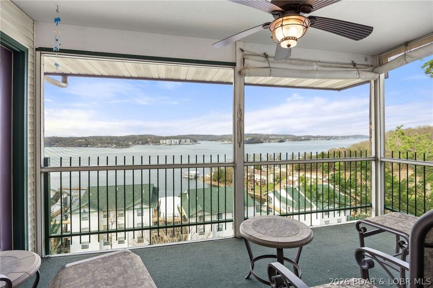 This beautiful top floor 3-bedroom, 2 bath unit offers breathtaking water views that stretch for miles. The home comes fully furnished and includes a 12'x 28' dock slip with an 8,000 lb poly lift-perfect for enjoying lake life to the fullest. Inside you'll find vaulted ceilings, cozy gas fireplace, and a water softener for added comfort. The lakefront master suite opens onto the deck and features a spacious walk in closet along with a private en suite bath complete with double vanity. This wonderful community offers convenient highway access and an array of amenities, including two pools, a clubhouse, tennis courts, a playground, a pet walking trail and more. Come live out your lake-life dreams in this beautiful condo with breathtaking views.