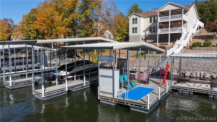 EXCEPTIONAL lakefront living in Maplewood Estates! This beautifully maintained home offers the effortless lake lifestyle so many dream about. Designed for comfort & convenience, nearly everything you need is located on the main level, including an open living, dining & kitchen area that flows to a spacious covered deck—perfect for morning coffee or sunset views. A generous primary suite is a true retreat with a soaking tub, oversized walk-in shower & ample closet space, plus two guest bedrooms, full bath & laundry also on the main level. Enjoy easy one-step entry & generous parking, make hosting family & friends effortless. The lower level expands your living space with a large family room featuring a wet bar, guest bedroom, full bath, game room & abundant storage—ideal for full-time or extended lake living. Enjoy peaceful cove protection at the 4-mile marker of the Gravois Arm - Perfect for swimming, fishing & relaxing at your concrete dock. A short boat ride takes you to Lake Burger, Jolly Rogers, Coconuts & more. True pride of ownership sets this one above the rest! No short term rentals. This is lake living done right—comfortable, convenient, and ready to be enjoyed!