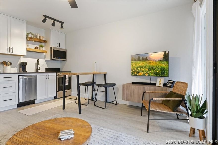 Welcome to Southwood Shores—one of the most sought-after complexes at Lake of the Ozarks! This cozy and modern 1 bed / 1 bath condo offers the perfect lakefront retreat at the 12 MM. Inside, you’ll find an updated space with stainless steel appliances, a dining area for two, and a comfortable living room with a flat-screen TV and sliding doors leading to a private lakefront balcony. The bedroom features a queen-sized bed, and the full bathroom includes a shower/tub combo. Step outside to enjoy beautiful lake views from your balcony with bar-height seating and a grill. Southwood Shores offers fantastic amenities including a lakeside pool, indoor pool, hot tub, clubhouse, tennis and basketball courts, playground, and private boat launch. Located off Horseshoe Bend, you’re just minutes from the Bagnell Dam Strip, Lodge of Four Seasons, Osage Beach shopping, dining, and popular waterfront restaurants. Ideal for a weekend getaway, full-time living, or investment property!