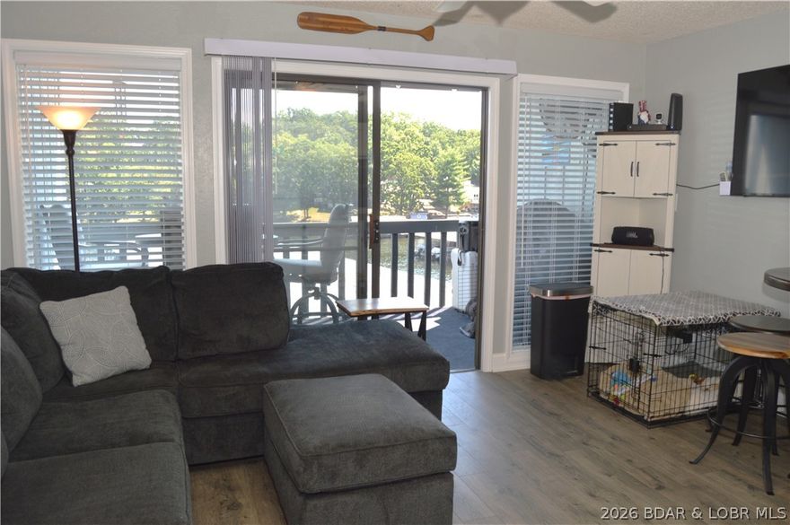 This is your opportunity to come to Lake of the Ozarks at an affordable price! This beautifully updated condo is ready for you to move in and enjoy!! New finishes and furniture throughout the condo including new blinds, stacked washer/dryer and storage cabinet. Great views of the main channel with cove protection for your boat. Enjoy your morning coffee or evening cocktails on your covered deck with the soft lights and fan to keep you cool. This condo may be small, but it has everything you need for lake fun including a 10x30 boat slip with hoist! Heron Bay is centrally located by land and water near all of the shopping, restaurants and fun lake attractions. And if you want extra income, this is the perfect rental opportunity!
