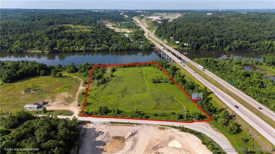 OUTSTANDING ground and location as you enter into the growing/developing Lake of the Ozarks! It will be the first thing you see when you visit & will be the last thing you see when you leave! Prominent visibility along Hwy 54 and includes 470' of River frontage and flat acreage! An average of over 20,000+ vehicles pass-by DAILY throughout the year. This parcel features 9.09 acres of gentle topo and 791' of highway frontage; you are destined for success with any development venture you have in mind. Property was rezoned to C-2 so there are MANY different opportunities to be had. Property is surveyed and there is a road plan for the ingress/egress of the property through MoDot. Until a developer comes along to give intended use, MoDot and the City will work with a prospective buyer on having a successful plan of action. Most of the hard work has been done to jump start your project! This property located less than 10 min. from Eldon, 15min. from Camdenton & seconds from Lake Ozark/Osage Beach. Approximately 3 hrs from KC airport & less than 2.5 hrs from St. Louis airport. With the Lake having many large develops taking off, it makes this investment opportunity a no brainer!!